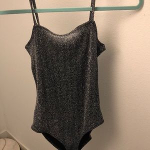 silver bodysuit with sparkles
